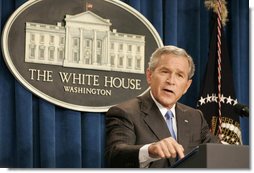President George W. Bush emphasizes a point as he responds to a question Monday, Aug. 21, 2006, during a news conference at the White House Conference Center Briefing Room. He told the gathered media "America is making a long-term commitment to help the people of Lebanon because we believe every person deserves to live in a free, open society that respects the rights of all."  White House photo by Paul Morse