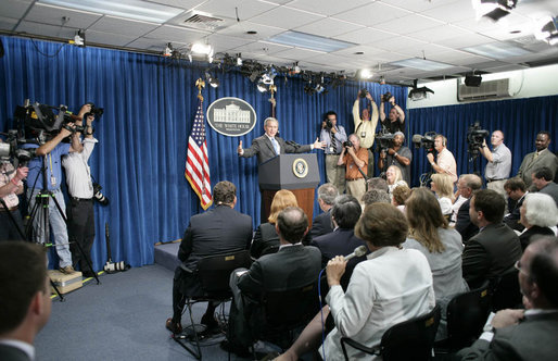 President George W. Bush gestures as he thanks the White House media for its hospitality Monday, Aug. 21, 2006, at the start of a news conference in the temporary press briefing room at the White House Conference Center. "Fancy digs you got here," the President told the gathering. "It's good to visit with you." White House photo by Paul Morse