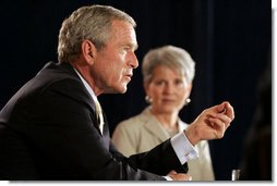 President George W. Bush addresses his remarks to an audience during his participation at a panel discussion Tuesday, Aug. 22, 2006, at the Minneapolis Marriott Southwest in Minnetonka, Minn., offering perspectives on efforts to enhance health care transparency and move towards a value-based health care competition. White House photo by Paul Morse