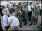 President George W. Bush meets military personnel upon his arrival Monday, Aug. 28, 2006, to Kessler Air Force Base in Biloxi, Miss., his first stop during a two-day visit to Biloxi and New Orleans to commemorate the one-year anniversary of Hurricane Katrina. White House photo by Eric Draper