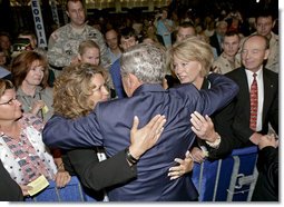 President George W. Bush greets audience members during his visit to the 88th Annual American Legion National Convention in Salt Lake City Thursday, Aug. 31, 2006.  White House photo by Eric Draper
