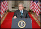 President George W. Bush emphasizes a point Wednesday Sept. 6, 2006 in the East Room of the White House, as he discusses the administration's draft legislation to create a strong and effective military commission to try suspected terrorists. The bill being sent to Congress, said President Bush, "reflects the reality that we are a nation at war, and that it is essential for us to use all reliable evidence to bring these people to justice." White House photo by Kimberlee Hewitt
