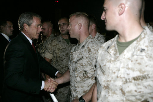 President George W. Bush shakes hands with U.S. Marine reservists from the 4th Civil Affairs Group based in Anacostia, Washington, who are deploying to the Al Anbar Province in Iraq, at Andrews Air Force Base, Friday, September 8, 2006. White House photo by Kimberlee Hewitt