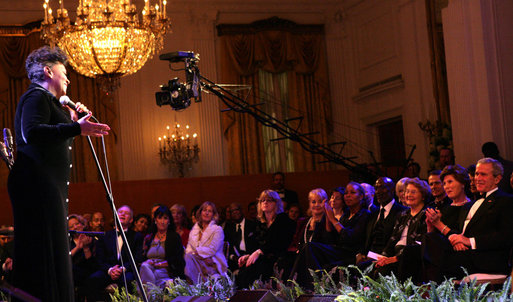 President George W. Bush and Mrs. Laura Bush listen as vocalist Anita Baker sings "My Funny Valentine" Thursday, Sept. 14, 2006, during an evening of festivities surrounding the Thelonious Monk Institute of Jazz dinner at the White House. White House photo by Shealah Craighead