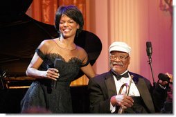 Vocalist Nnenna Freelon and musician Clark Terry perform Thursday, Sept. 14, 2006, in the East Room of the White House during the Thelonious Monk Institute of Jazz dinner. White House photo by Shealah Craighead