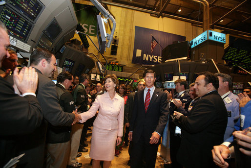 Mrs. Laura Bush is greeted on the floor of the New York Stock Exchange Monday, Sept. 18, 2006. Mrs. Bush visited the exchange with a delegation of entrepreneurs from around the world to participate in the close of trading and to ring the Closing Bell. White House photo by Shealah Craighead