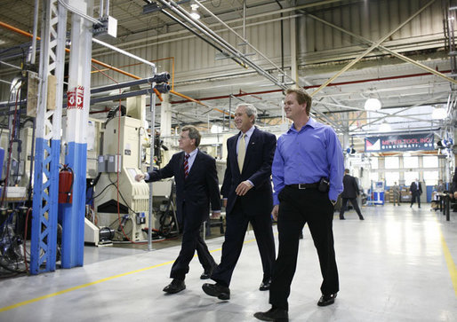President George W. Bush tours Meyer Tool, Inc., in Cincinnati, with Sen. Mike DeWine (R-Ohio), left, and Beau Easton, the company's Director of Continuous Improvement during an Ohio stop Monday, Sept. 25, 2006. The President took the opportunity to deliver remarks on the U.S. economy, addressing its strength and how important small businesses are to the nation's economic vitality. White House photo by Paul Morse