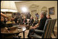 President George W. Bush addresses the media during a meeting with business leaders on Lebanon Private Sector Initiative in the Oval Office Monday, Sept. 25, 2006. Seated next to President Bush is CEO John Chambers of Cisco Systems. Participants also include Chairman Craig Barrett of Intel Corp., CEO Ray Irani of Occidental Petroleum Corp., and Chairman Yousif Ghafari of Ghafari, Inc. "Our goal, and our mission, is to help Lebanese citizens and Lebanese businesses not only recover, but to flourish, because we believe strongly in the concept of a democracy in Lebanon," said President Bush. White House photo by Eric Draper