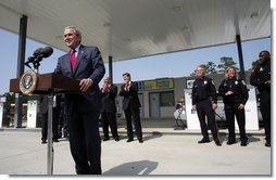 President George W. Bush talks about energy issues and the importance of developing and using alternative fuels Thursday, Sept. 28, 2006, during a visit to the Hoover Public Safety Center in Hoover, Ala. The city has just opened an alternative fueling station to provide E85 (ethanol) and biodiesel fuels for public agency vehicles. White House photo by Paul Morse