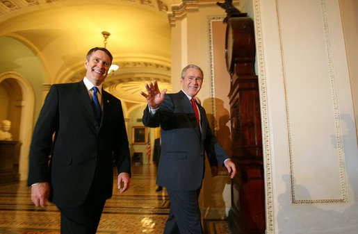 President George W. Bush and Senate Majority Leader Bill Frist, R-Tenn., walk past the press as they arrive for the Republican Senate Conference at the U. S. Capitol Thursday, Sept. 28, 2006. White House photo by Eric Draper