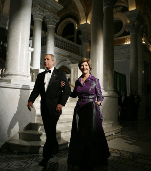 President George W. Bush and Laura Bush walk to the Great Hall of the Library of Congress in Washington, D.C., attending the 2006 National Book Festival Gala, an annual event of books and literature, Friday evening, Sept. 29, 2006. White House photo by Paul Morse