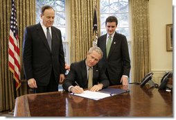 President George W. Bush signs S. 3850, The Credit Rating Agency Reform Act of 2006, in the Oval Office Friday, Sept. 29, 2006. Standing with President Bush are bill sponsors Senator Richard Shelby, R-Ala., left, and Representative Mike Fitzpatrick, R-Pa. The legislation removes the Securities and Exchange Commission from the process of approving certain rating agencies as nationally recognized statistical rating organizations.  White House photo by Eric Draper
