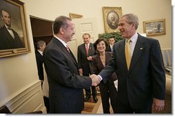 President George W. Bush welcomes Prime Minister Recep Tayyip Erdogan of Turkey to the Oval Office Monday, October 2, 2006.  White House photo by Eric Draper