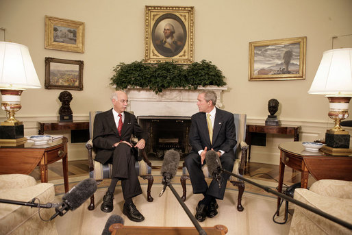 President George W. Bush meets with Andrew Natsios, U.S. Special Envoy for Sudan, in the Oval Office Monday, Oct. 2, 2006. White House photo by Eric Draper