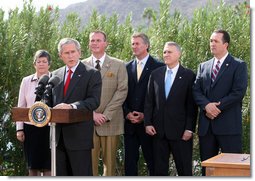 President George W. Bush is joined by Arizona legislators as he delivers his remarks at the signing ceremony for H.R. 5441, the Department of Homeland Security Appropriations Act for fiscal year 2007, Wednesday, Oct. 4, 2006, in Scottsdale. From left are: Arizona Gov. Janet Napolitano, Rep. J.D. Hayworth, Rep. Rick Renzi, Sen. Jon Kyl, R-Ariz., and Rep. Trent Franks. President Bush stressed, "This legislation will give us better tools to enforce our immigration laws and to secure our southern border."  White House photo by Eric Draper