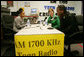 Mrs. Laura Bush participates in a radio interview with Amber Bellamy, age 17, left, and Elliott White, Jr., age 22, Wednesday, October 4, 2006, during a visit to the Children’s Training Network/AM 1700 Radio Program in Buffalo, New York, as part of the President’s Helping America’s Youth initiative. Together with Crucial Human Service Center and other Buffalo community programs, AM 1700 Station encourages caring adults to connect as mentors with high-risk youth. White House photo by Shealah Craighead