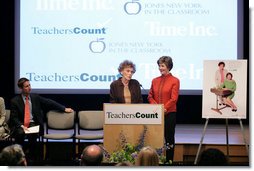Mrs. Laura Bush stands with her second grade teacher, Charlene Gnagy, as Mrs. Gnagy speaks to the audience Thursday, October 5, 2006, during the TeachersCount “Behind every famous person is a fabulous teacher” PSA campaign launch ceremony in New York City. The campaign is to help create awareness for teachers and the role they play in the lives of children and to raise the status of the teaching profession. White House photo by Shealah Craighead