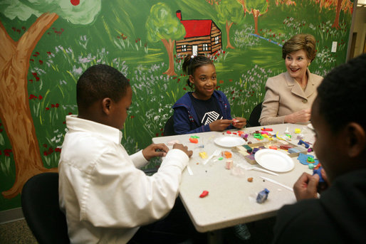 Mrs. Laura Bush sculpts clay with participants of the Communications Through Art program at the Knox County Public Defenders Community Law Office in Knoxville, Tennessee, Wednesday, October 11, 2006, as part of the President’s Helping America’s Youth program. Communications Through Art program uses the arts to help young people express themselves and to deal with important issues of the day. White House photo by Shealah Craighead