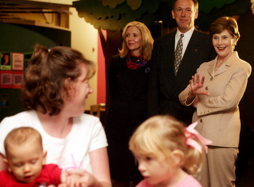 Mrs. Laura Bush waves to visitors during a tour of Cinergy Children’s Museum in Cincinnati, Ohio, Wednesday, October 11, 2006. Ranked among the world’s top 25 children museums, Cinergy Children's Museum offers more than 1,800 hours of programming for children in areas such as arts, culture, reading and science. White House photo by Shealah Craighead
