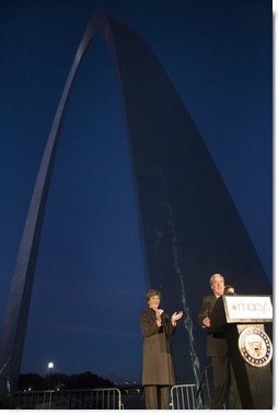 Mrs. Laura Bush applauds Chairman and CEO William McNamara of Macy's Midwest, as he delivers welcoming remarks during the Arch Lighting for Breast Cancer Awareness event in Thursday, Oct. 12, 2006, in St. Louis. The Gateway Arch was illuminated in pink in honor of Breast Cancer Awareness Month. White House photo by Shealah Craighead
