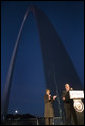 Mrs. Laura Bush applauds Chairman and CEO William McNamara of Macy's Midwest, as he delivers welcoming remarks during the Arch Lighting for Breast Cancer Awareness event in Thursday, Oct. 12, 2006, in St. Louis. The Gateway Arch was illuminated in pink in honor of Breast Cancer Awareness Month. White House photo by Shealah Craighead