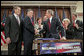 President George W. Bush shakes hands with Congressman Peter King, R-N.Y., chairman of the Homeland Security Committee, after signing H.R. 4954, the SAFE Port Act, in the Dwight D. Eisenhower Executive Office Building Friday, Oct. 13, 2006. Also pictured from left are Sen. Bill Frist, R-Tenn.; Sen. Susan Collins, R-Maine; Sen. Robert Bennett, R-Utah; Sen. Patty Murray, D-Wash.; and Sen. Norm Coleman, R-Minn. White House photo by Paul Morse