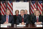 President George W. Bush addresses members of the President’s Management Council, Friday, Oct. 13, 2006, in a meeting at the Eisenhower Executive Office Building in Washington, D.C. Pictured with the President are OMB Director Rob Portman, left, and Labor Deputy Secretary Steven Law. The council met to discuss the President’s Management Agenda accomplishments, which will be summarized in a government-wide report to Federal employees and Congress on the state of the government’s management practices. White House photo by Eric Draper