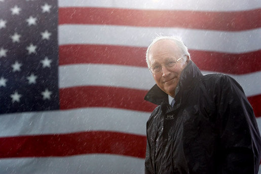 Vice President Dick Cheney stands in a steady rain during a rally at Fort Campbell Army Base in Fort Campbell, Ky., Monday, October 16, 2006. The Vice President visited Fort Campbell to welcome home over 4,000 troops from the 101st Airborne Division who returned in September from a tour of duty in Iraq. White House photo by David Bohrer