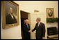 President George W. Bush welcomes Minister Mentor Lee Kuan Yew of Singapore to the Oval Office Monday, Oct. 16, 2006. White House photo by Eric Draper