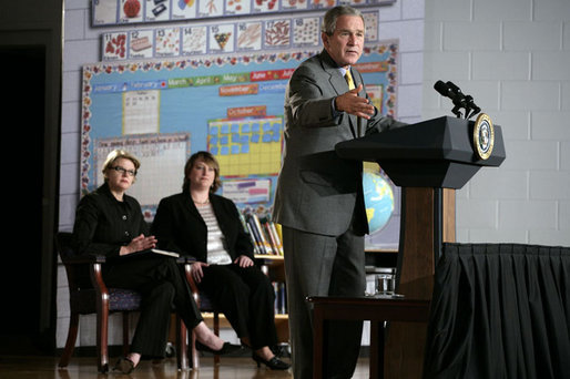 President George W. Bush delivers remarks Wednesday, Oct. 18, 2006, on No Child Left Behind during a visit to the Waldo C. Falkener Elementary School in Greensboro, N.C. The President congratulated the school's principal, teachers and the parents for "working hard to make this a fantastically interesting place for our children to go to school." Seated in the background are Secretary of Education Margaret Spellings and Dr. Amy Holcombe, Principal of the school. White House photo by Paul Morse