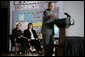 President George W. Bush delivers remarks Wednesday, Oct. 18, 2006, on No Child Left Behind during a visit to the Waldo C. Falkener Elementary School in Greensboro, N.C. The President congratulated the school's principal, teachers and the parents for "working hard to make this a fantastically interesting place for our children to go to school." Seated in the background are Secretary of Education Margaret Spellings and Dr. Amy Holcombe, Principal of the school. White House photo by Paul Morse