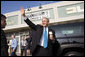With ice cream in hand, President George W. Bush departs Manning's Ice Cream and Milk in Clarks Summit, Pa., Thursday, Oct. 19, 2006. White House photo by Paul Morse