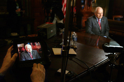 Vice President Dick Cheney is seen on a TV monitor during a radio and television interview with Sean Hannity of FOX News in the Vice President's Ceremonial Office, Tuesday, October 24, 2006. White House photo by David Bohrer