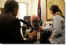 Vice President Dick Cheney talks with Juan Williams, left, of National Public Radio during a taped radio interview in the Vice President's office during the White House Radio Day, Tuesday, October 24, 2006.  White House photo by David Bohrer