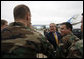 President George W. Bush greets military personnel and families Thursday, Oct. 26, 2006, before departing Des Moines International Airport in Des Moines, Iowa. White House photo by Paul Morse
