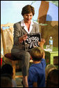 Mrs. Laura Bush calls on a young member of the audience to speak after she finished reading the book, “The Spider and the Fly” by Mary Howitt, illustrated by Tony DiTerlizzi, during a visit to the West Palm Beach Public Library in West Palm Beach, Fla., Friday, Oct. 27, 2006. The Library began its reading room in a congregational church in 1894, and has grown to have over one hundred-thousand books in their collection. White House photo by Shealah Craighead