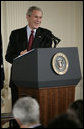 President George W. Bush smiles as he responds to a reporter's question Wednesday, Nov. 8, 2006, during a news conference in the East Room of the White House to address the results of Tuesday's elections. White House photo by Eric Draper