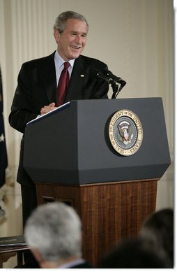 President George W. Bush smiles as he responds to a reporter's question Wednesday, Nov. 8, 2006, during a news conference in the East Room of the White House to address the results of Tuesday's elections. White House photo by Eric Draper
