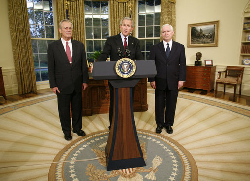 Flanked by Secretary of Defense Donald Rumsfeld, left, and Dr. Robert Gates, President George W. Bush announces the resignation of Secretary Rumsfeld Wednesday, Nov. 8, 2006, and the intention to nominate Dr. Gates as his successor. White House photo by Paul Morse