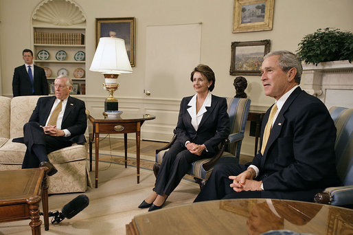 President George W. Bush meets with Congresswoman Nancy Pelosi (D-Calif.) and Congressman Steny Hoyer (D-Md.) in the Oval Office Thursday, Nov. 9, 2006. "First, I want to congratulate Congresswoman Pelosi for becoming the Speaker of the House, and the first woman Speaker of the House. This is historic for our country,” President Bush said. He also stated, "This is the beginning of a series of meetings we'll have over the next couple of years, all aimed at solving problems and leading the country." White House photo by Eric Draper