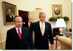 President George W. Bush welcomes President-elect Felipe Calderon of Mexico to the Oval Office Thursday, Nov. 9, 2006.  White House photo by Eric Draper