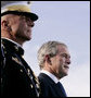 President George W. Bush stands with Commandant of the Marine Corps, General Michael Hagee, at the dedication ceremony of the National Museum of the Marine Corps Friday, Nov. 10, 2006, in Quantico, Va. White House photo by Paul Morse