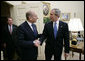 President George W. Bush welcomes Israeli Prime Minister Ehud Olmert to the White House for a meeting Monday, Nov. 13, 2006. White House photo by Eric Draper