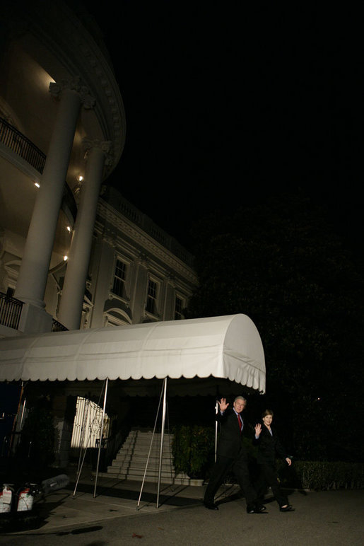 President George W. Bush and Laura Bush depart the White House to board Marine One on the South Lawn en route to Russia and Asia Tuesday, November 14, 2006. White House photo by Kimberlee Hewitt