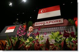 President George W. Bush delivers remarks during a visit Thursday, Nov. 16, 2006, to the National University of Singapore. The President told the audience, "Our roots, America's roots in Singapore are deep and enduring." White House photo by Paul Morse