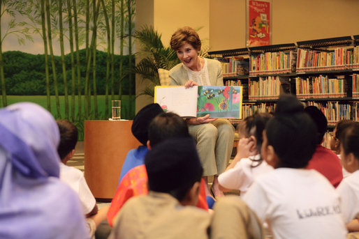 Mrs. Laura Bush reads Miss Spider's Tea Party during her visit Thursday, Nov. 16, 2006, to the National Library Building's Children's Reading Room in Singapore. Afterward, Mrs. Bush participated in a brief question-and-answer session with the kids. White House photo by Shealah Craighead