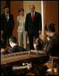 President George W. Bush and Mrs. Laura Bush are joined by Dr. Vivian Balakrishnan as they watch a traditional gamelan musical performance Thursday, Nov. 16, 2006, at the Asian Civilisations Museum in Singapore. White House photo by Paul Morse