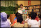 Mrs. Laura Bush reads Miss Spider's Tea Party during her visit Thursday, Nov. 16, 2006, to the National Library Building's Children's Reading Room in Singapore. Afterward, Mrs. Bush participated in a brief question-and-answer session with the kids. White House photo by Shealah Craighead