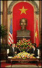 President George W. Bush and Viet President Nguyen Minh Triet meet in the Great Hall of the Presidential Palace in Hanoi Friday, Nov. 17, 2006. President Bush told his host, "I've been reading and studying about your country and I have seen now firsthand the great vibrancy and the excitement that's taking place in Vietnam." White House photo by Eric Draper