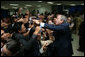 President George W. Bush greets U.S. Embassy staff and families upon his arrival to Jakarta, Indonesia, Nov. 20, 2006. White House photo by Paul Morse